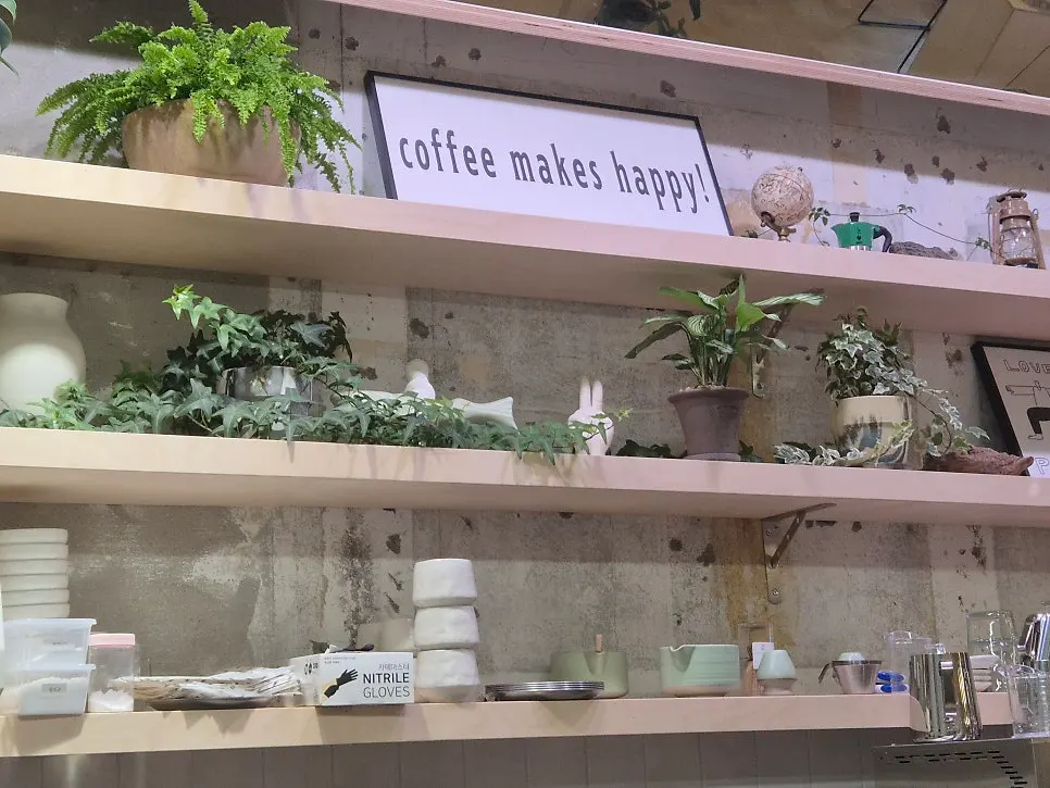 Drip coffee being prepared, seen from the bar seats