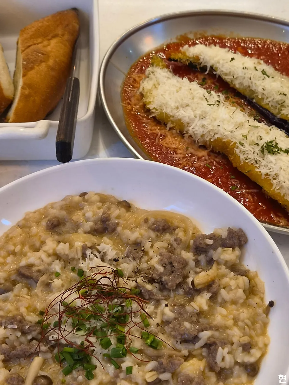 Unexpected Eggplant and bulgogi risotto served together
