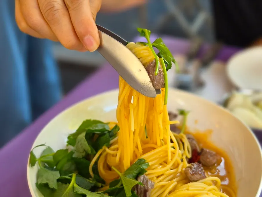 Pasta topped with doenjang cream sauce and cubed steak