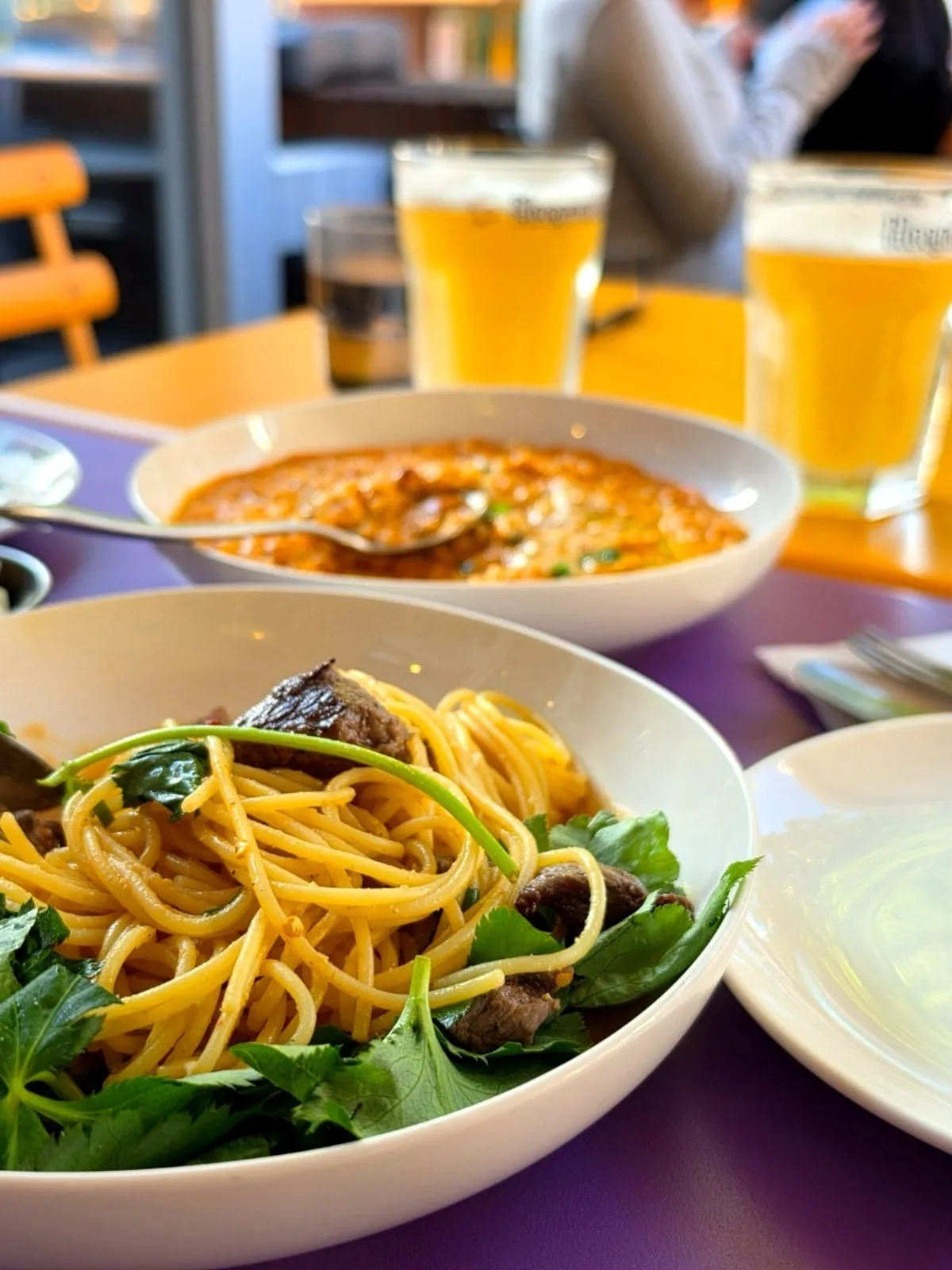Table setting of pasta and risotto at Seventy Four Myeongdong Cathedral Main Branch