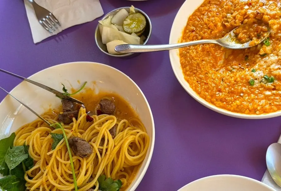 Two plates: kimchi risotto and chamnamul doenjang pasta