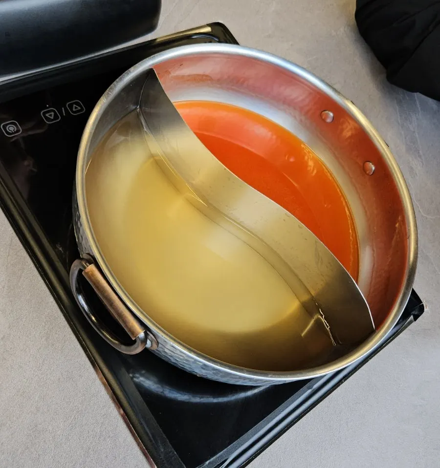 Pot of half-and-half shabu-shabu broth