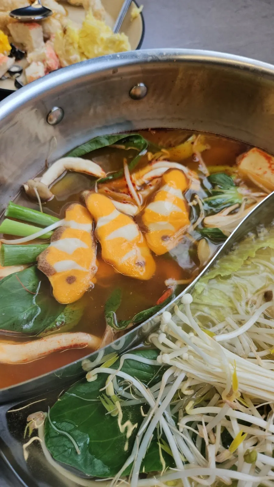 Table of shabu-shabu enjoyed with various sauces