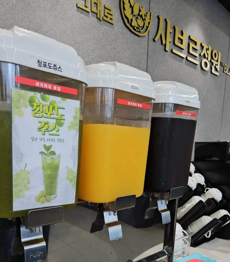 Drink station with juice, coffee, and soda