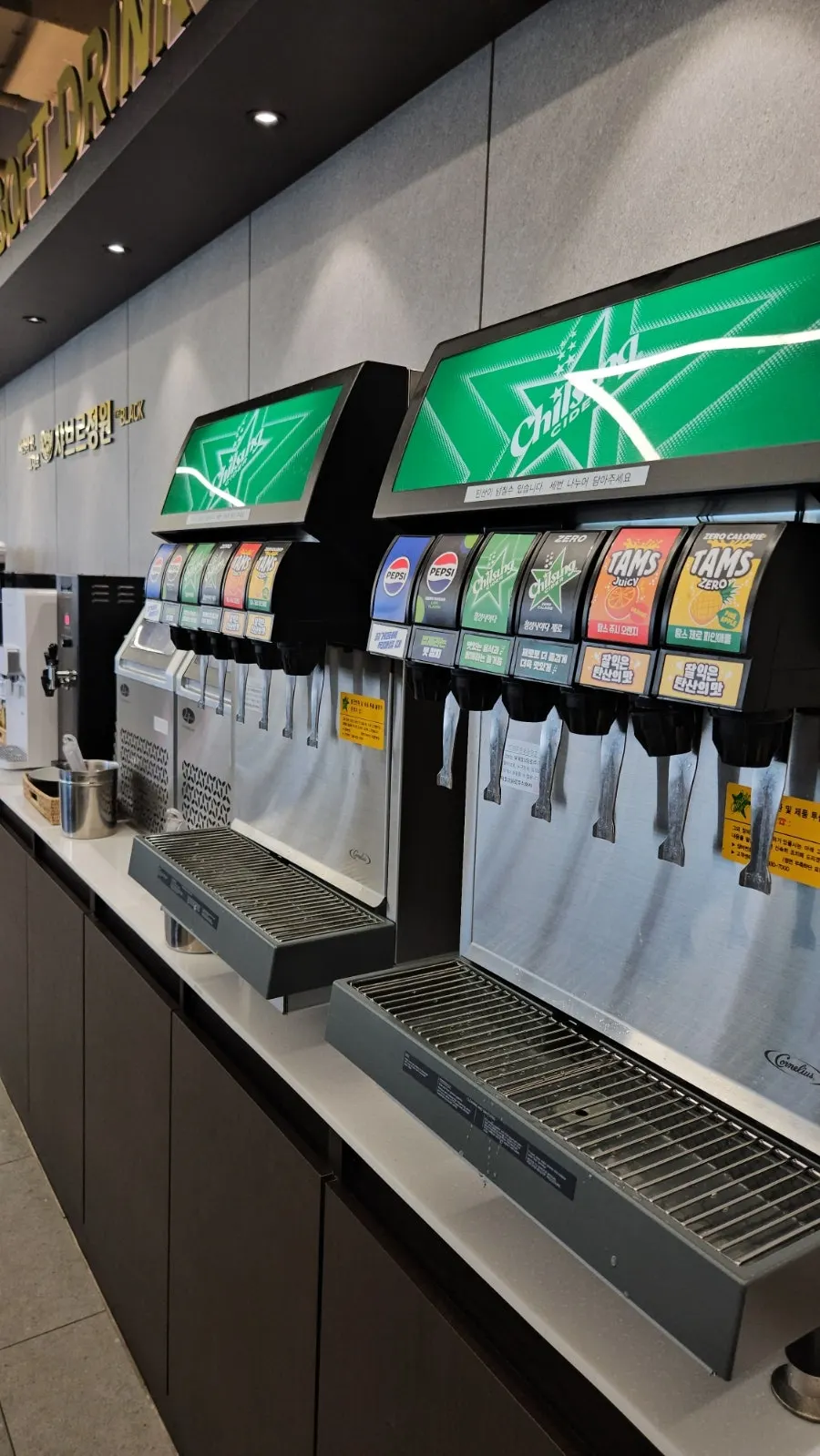 Self-serve station with cups and beverage machines