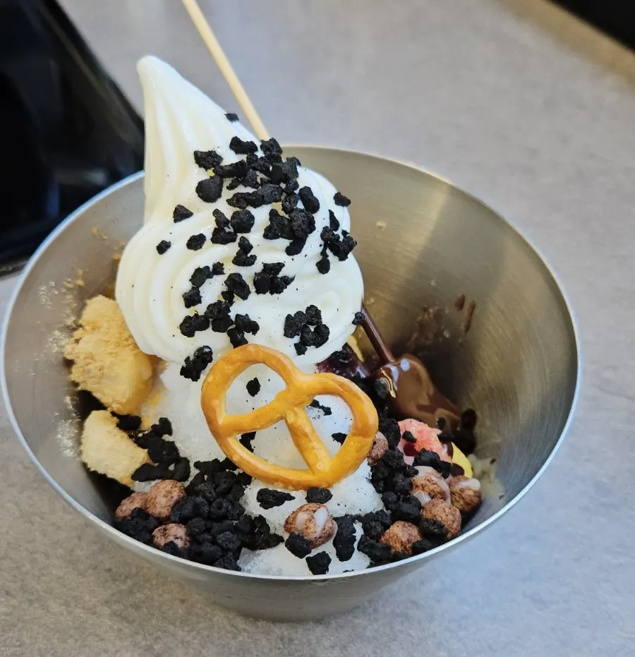 Plate loaded with various desserts