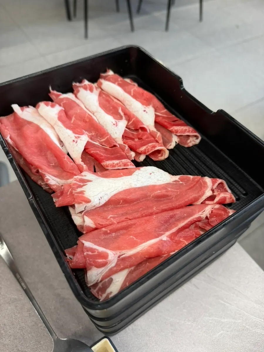 Plate of unlimited shabu-shabu meat