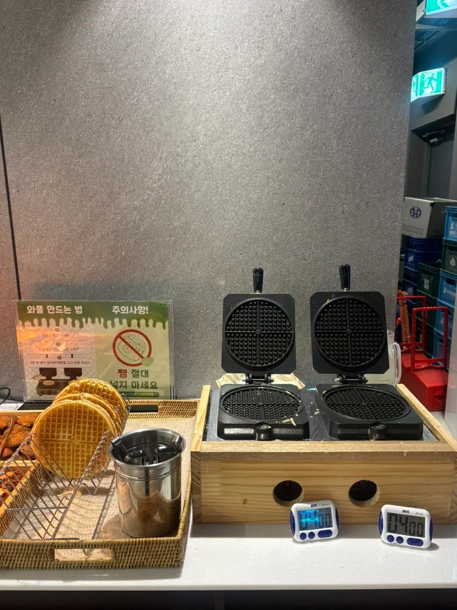 Bread corner with croissants, coffee buns and waffles