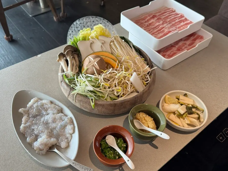 Shabu-shabu table spread at Shabu In Seoul Apgujeong Rodeo