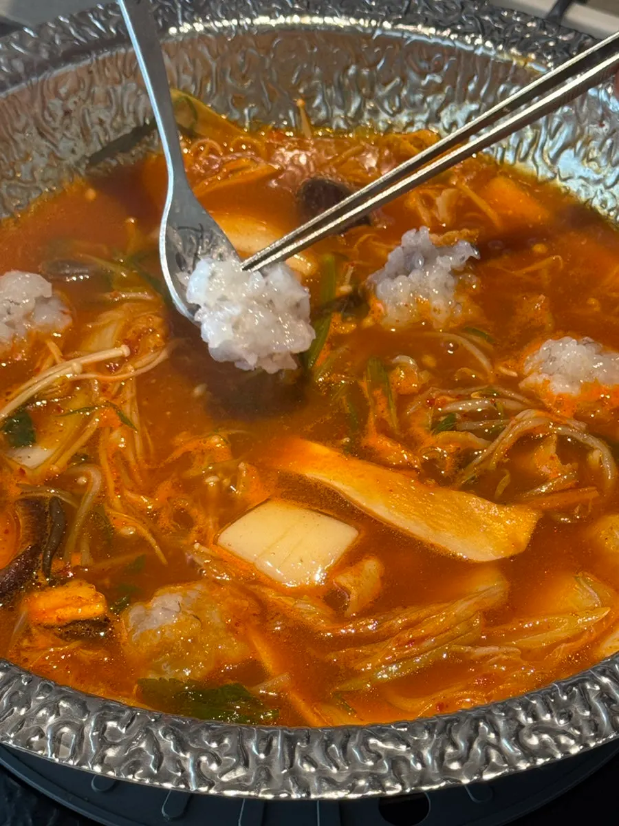 Plate of handmade raw shrimp ball mixture