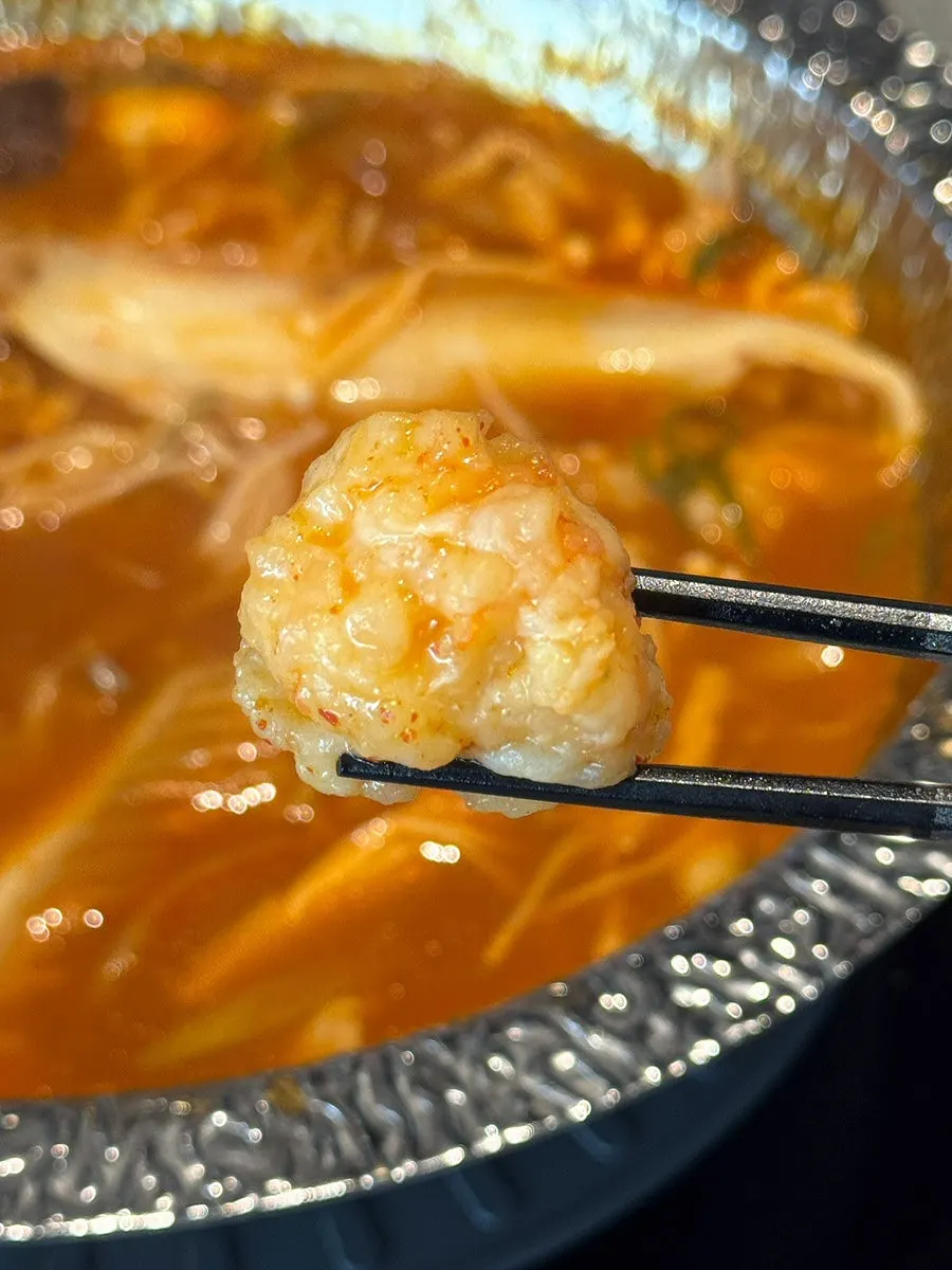 Shrimp balls cooked in the broth