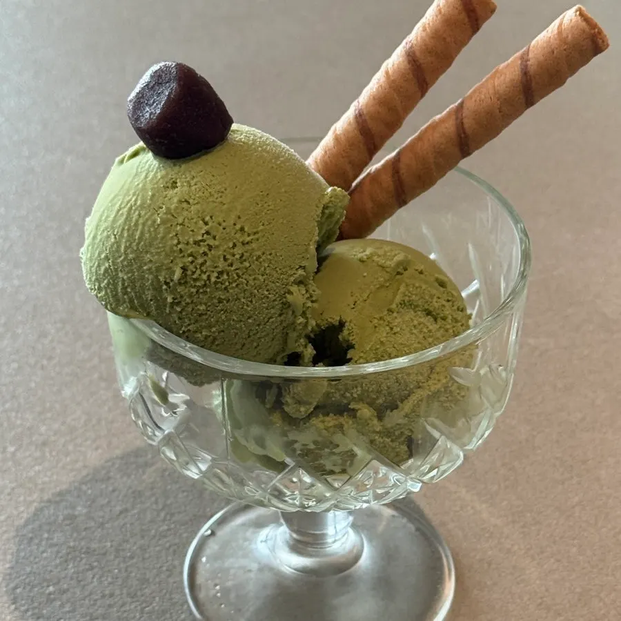 Omija tea served alongside dessert