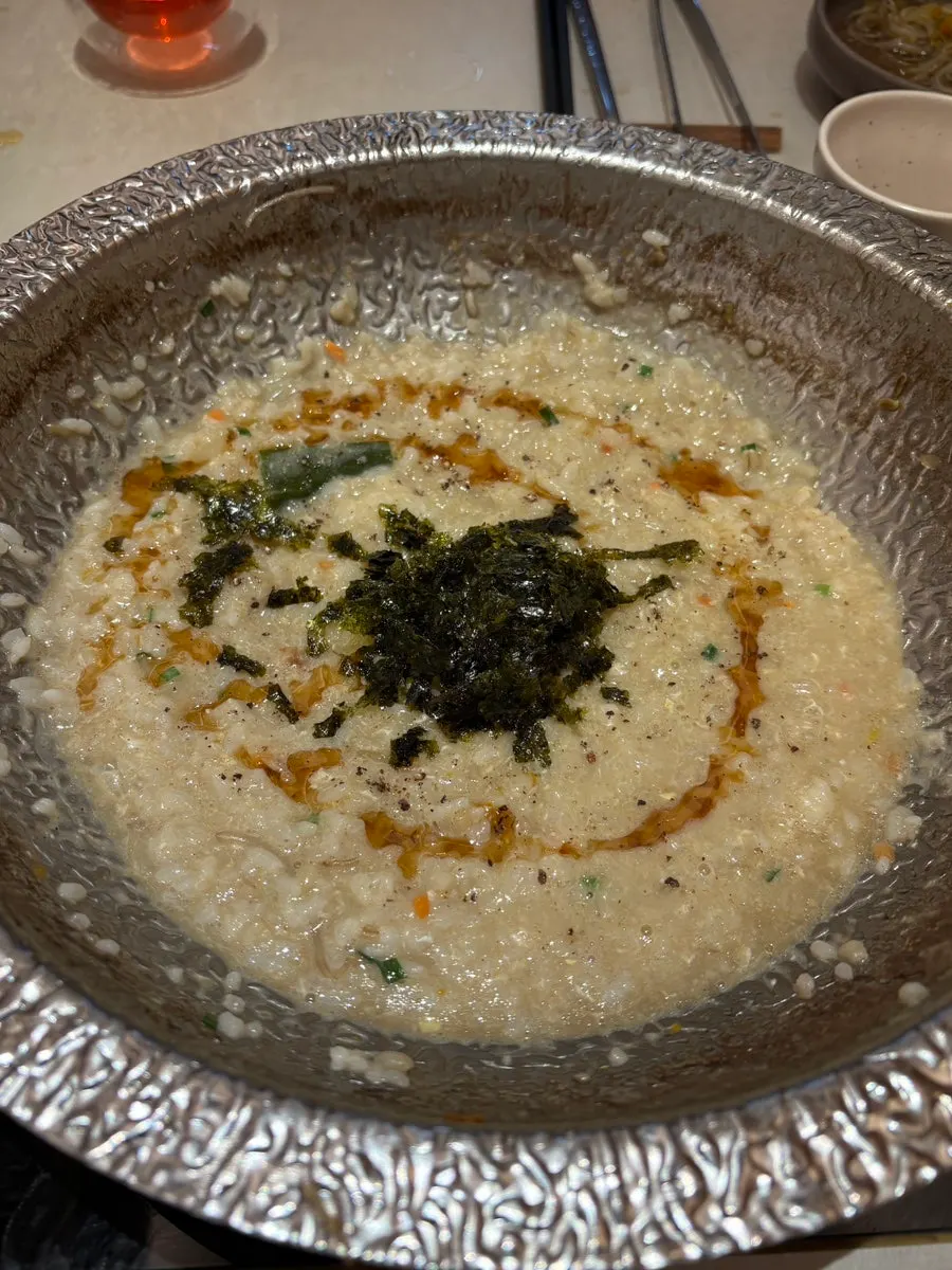 Pot starting to simmer with egg porridge