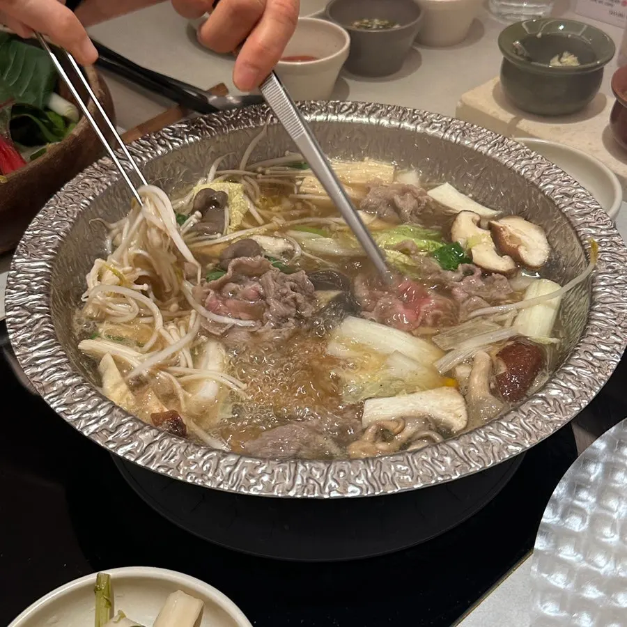 Vegetables and mushrooms added to the broth