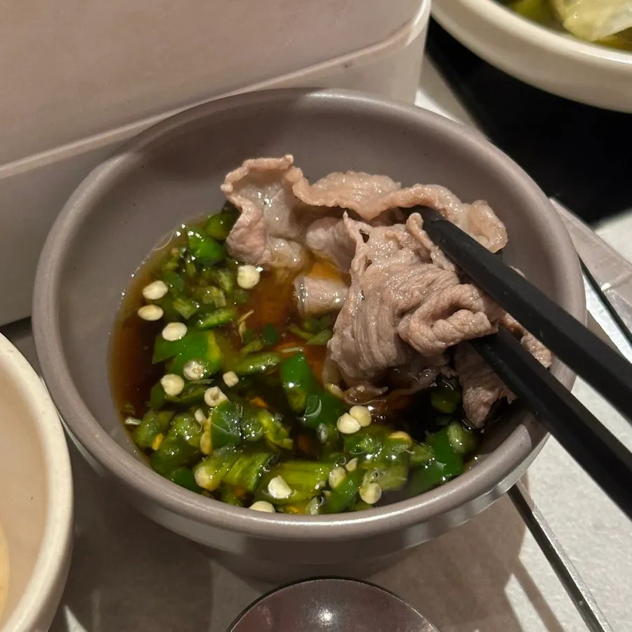 Shabu-shabu pot filled with vegetables