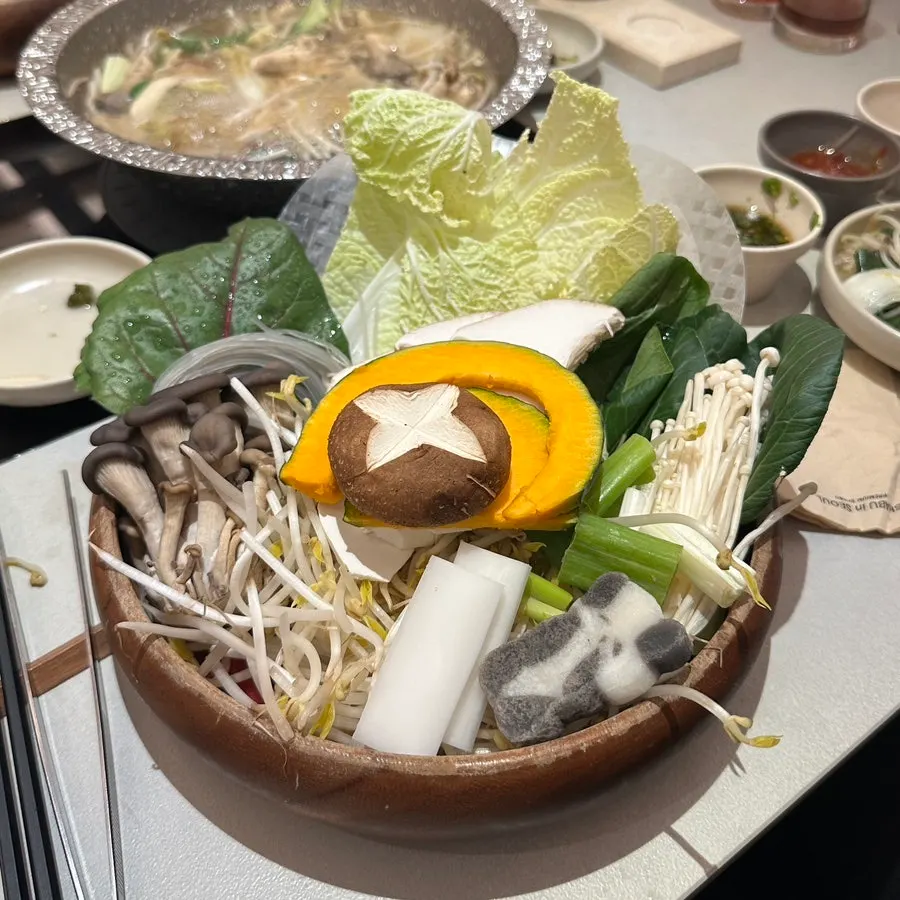 Plate of extra mixed vegetables and mushrooms ordered as an add-on