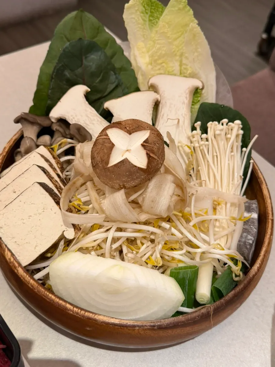 Sukiyaki broth with a spread of vegetables