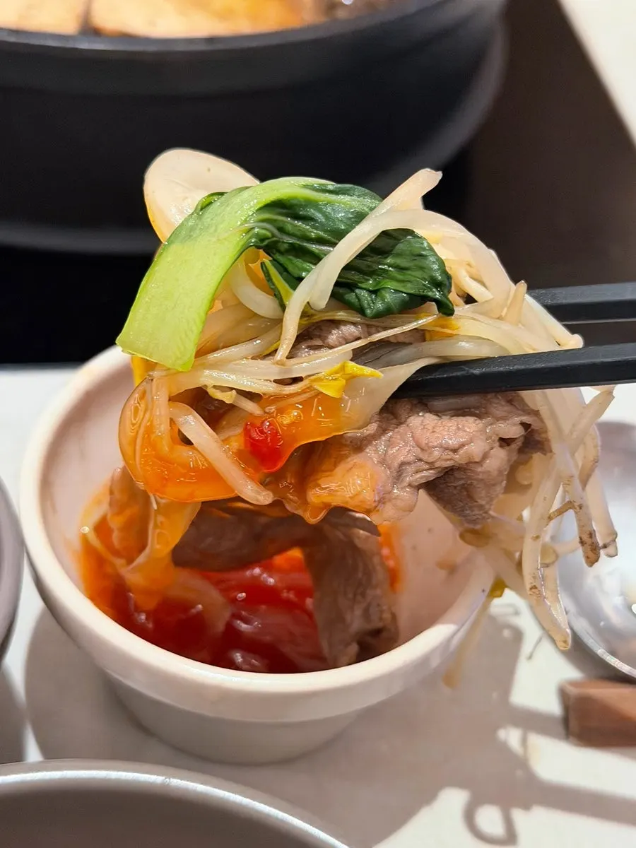Shabu-shabu meat dipped in sauce