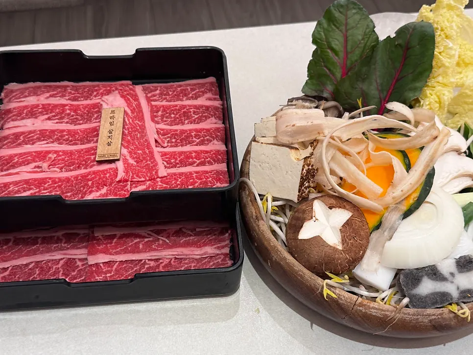 Egg served alongside the sukiyaki broth