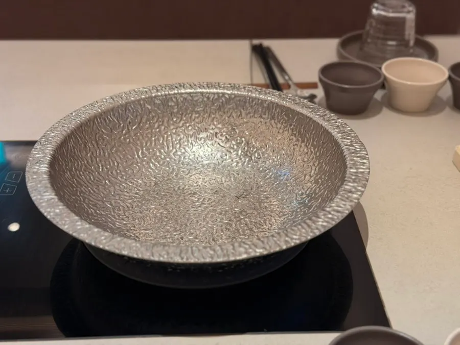 Shabu-shabu pot set up on the table