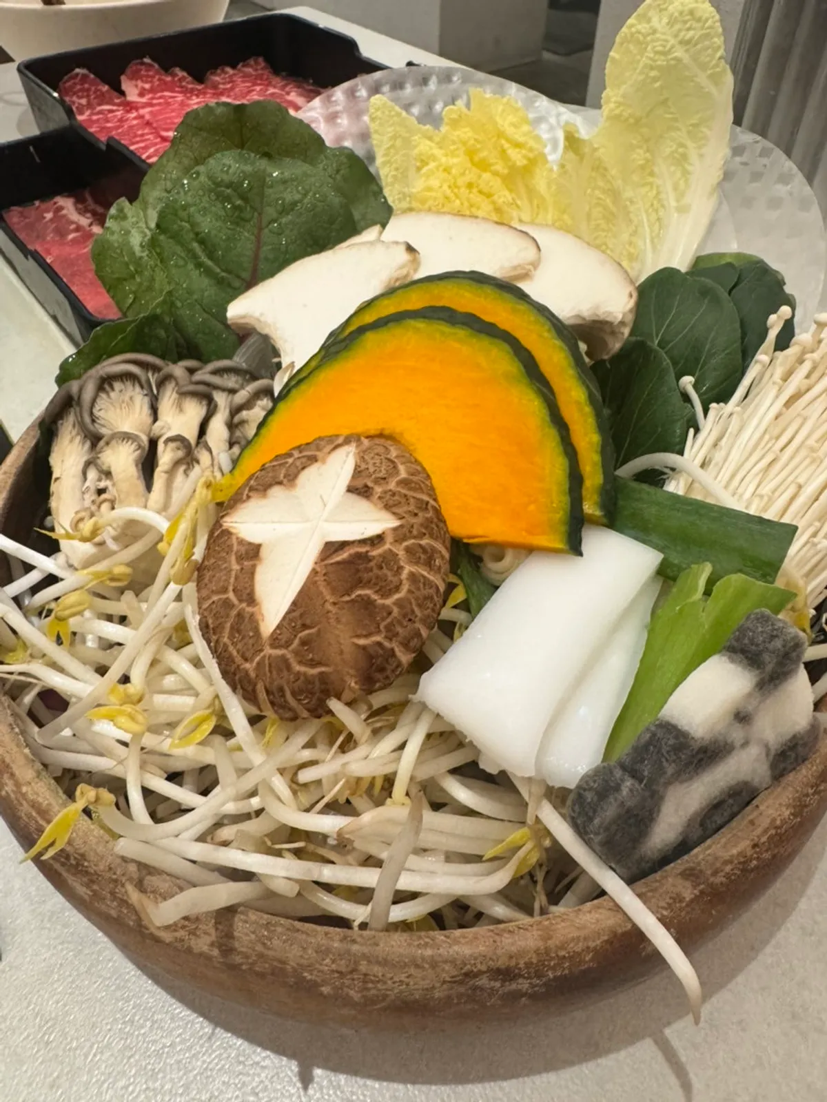 Basic shabu-shabu vegetable setting with mushrooms, zucchini and cabbage