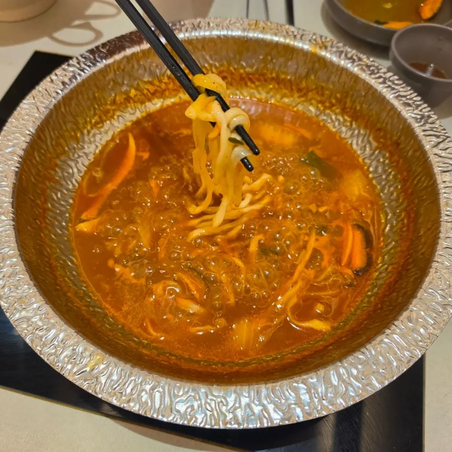 Spicy mushroom broth deepened in flavor