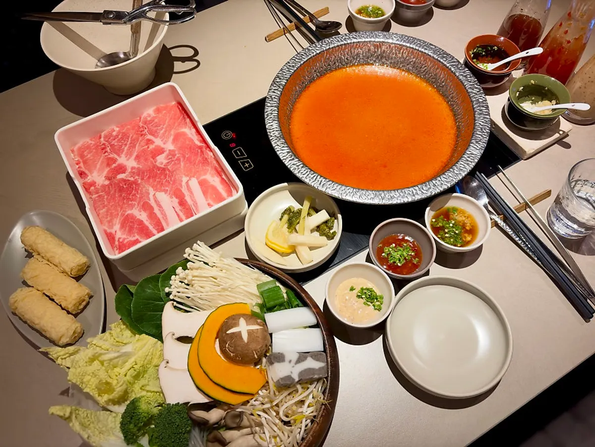 Black pork neck shabu-shabu table setting at Shabu in Seoul Yongsan Main Branch