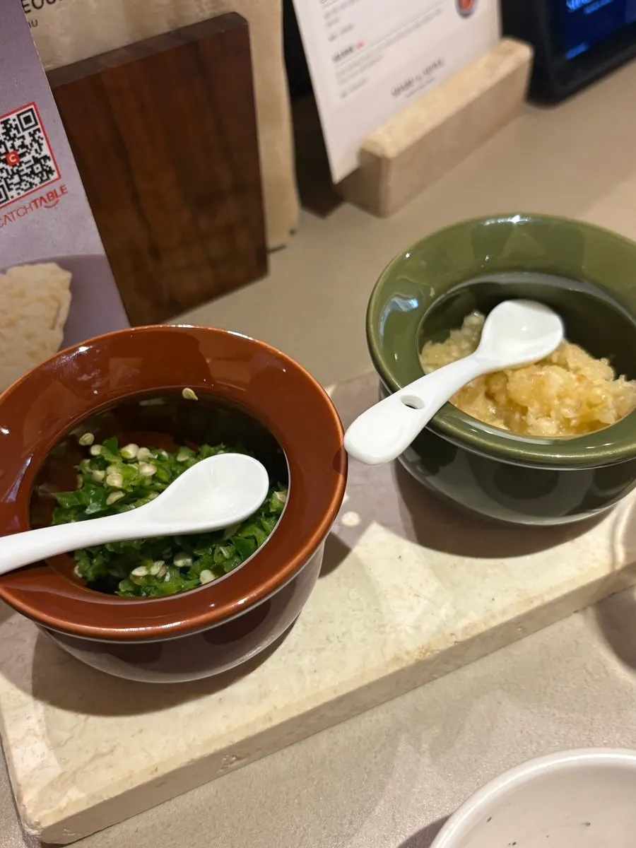 The three basic sauces: sesame sauce, chili sauce, and yuzu soy sauce