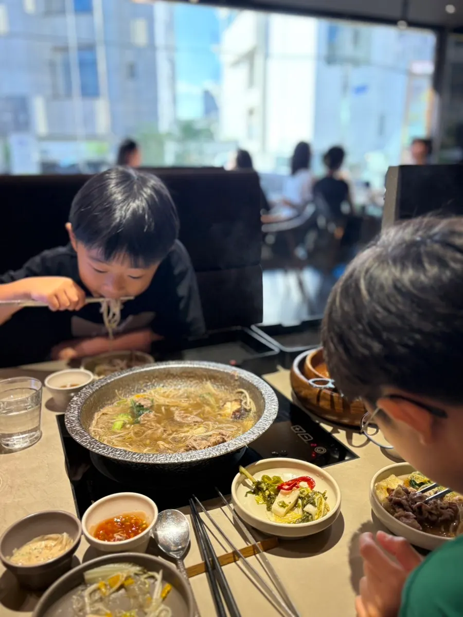 Eye of round shabu-shabu meat cooking in the broth