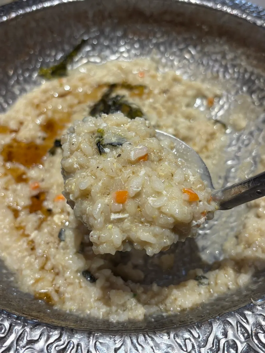 A finished bowl of nutty egg porridge