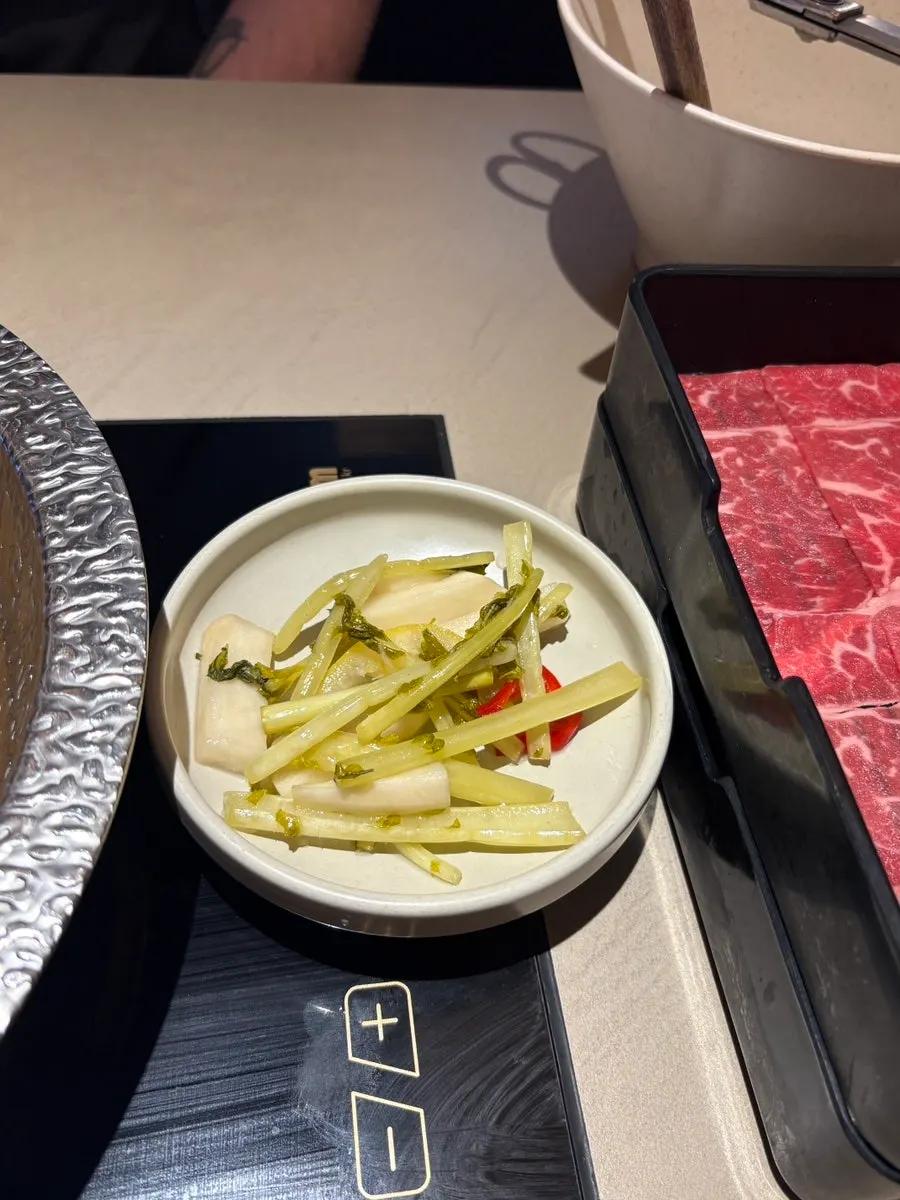 Broth pot with side of yeolmu kimchi