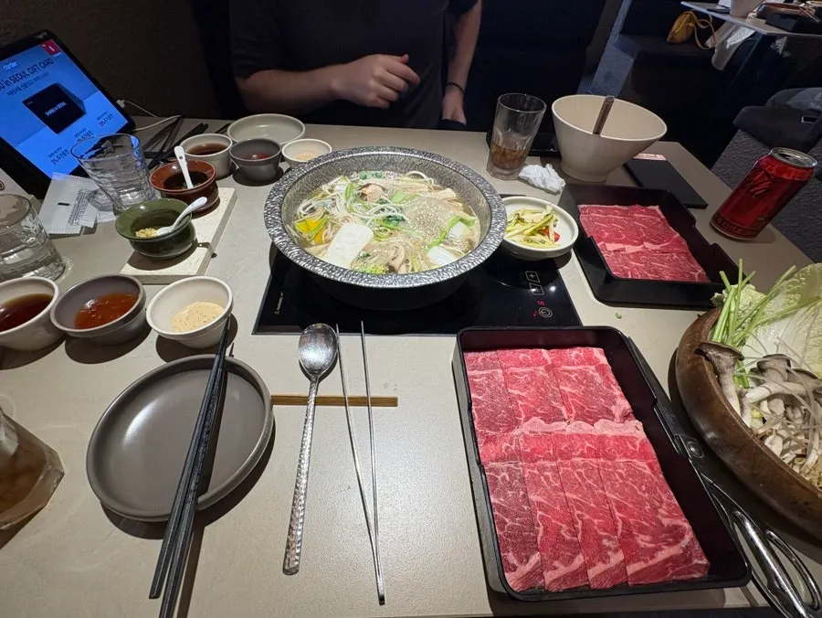 Full shabu-shabu spread on the table