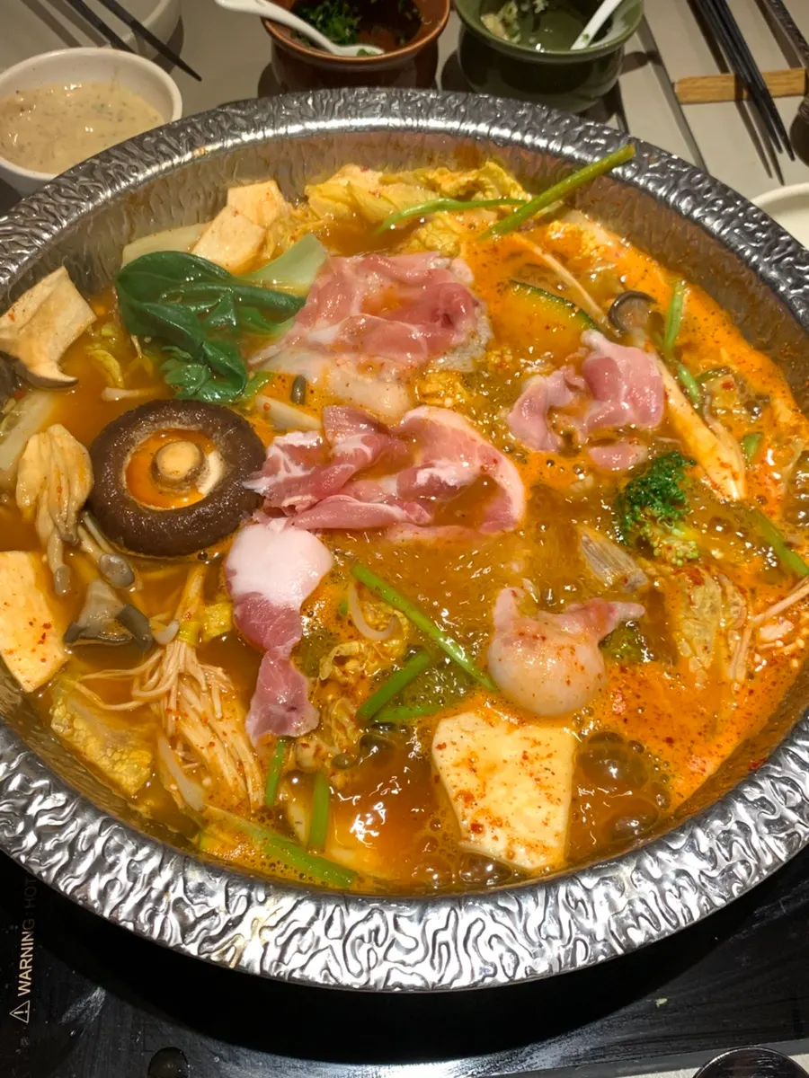Spicy mushroom broth pot loaded with napa cabbage and mushrooms