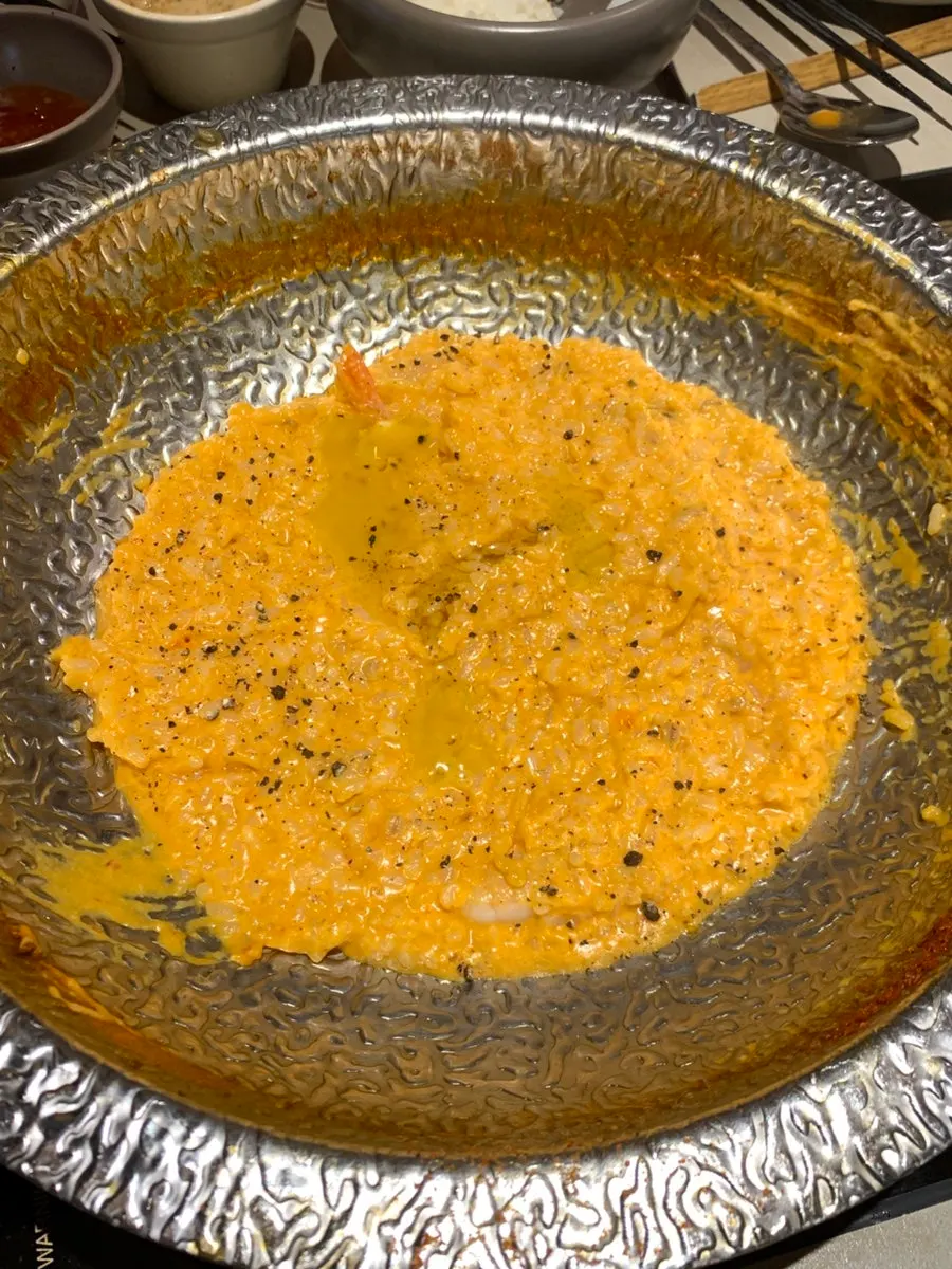 Spicy mushroom broth with vegetables and meat mixed together