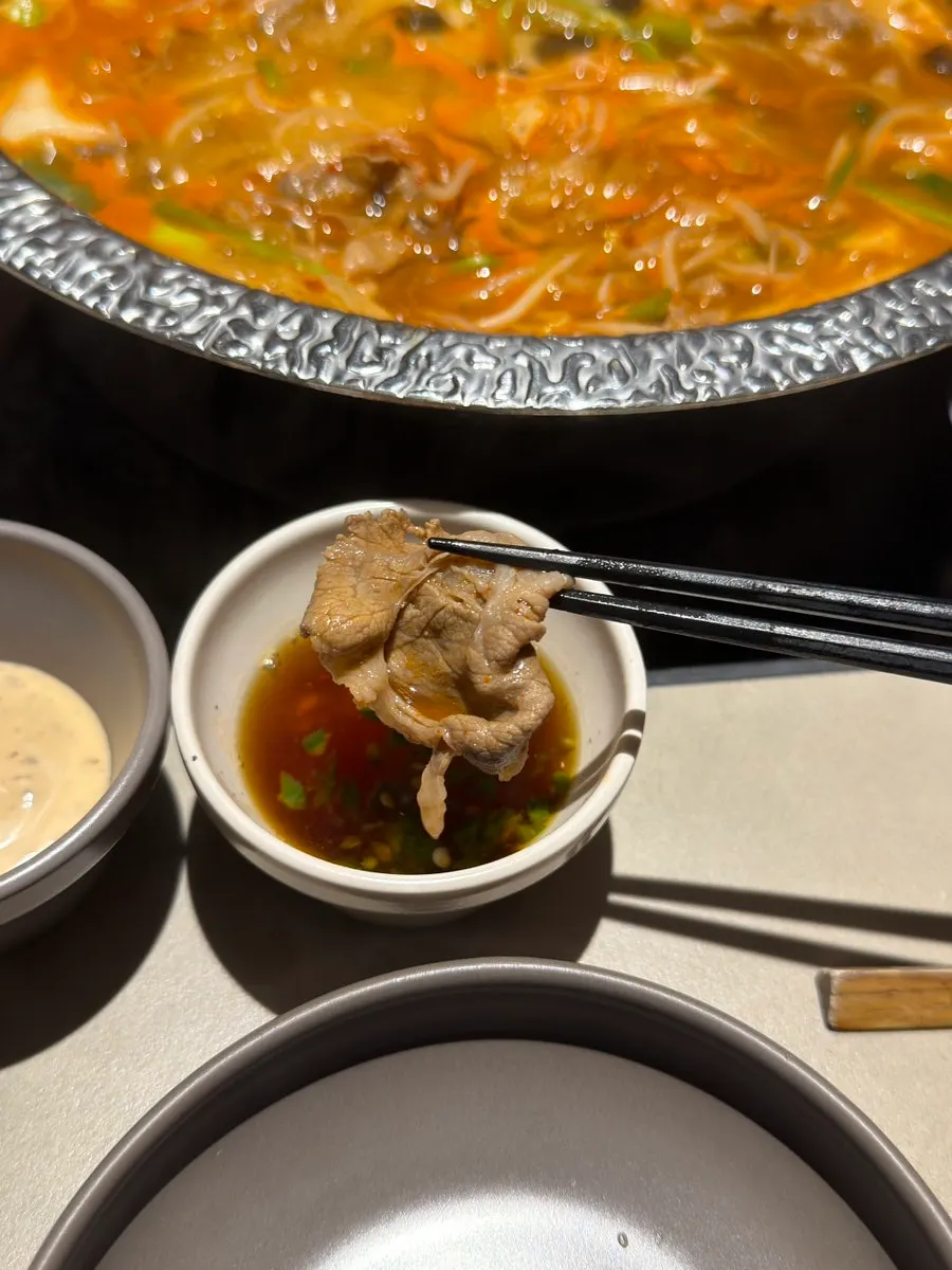 Vegetables being cooked in boiling broth