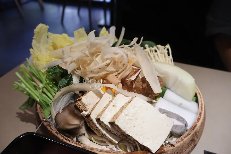 Bowl of basic vegetables with napa cabbage, mushrooms, and glass noodles
