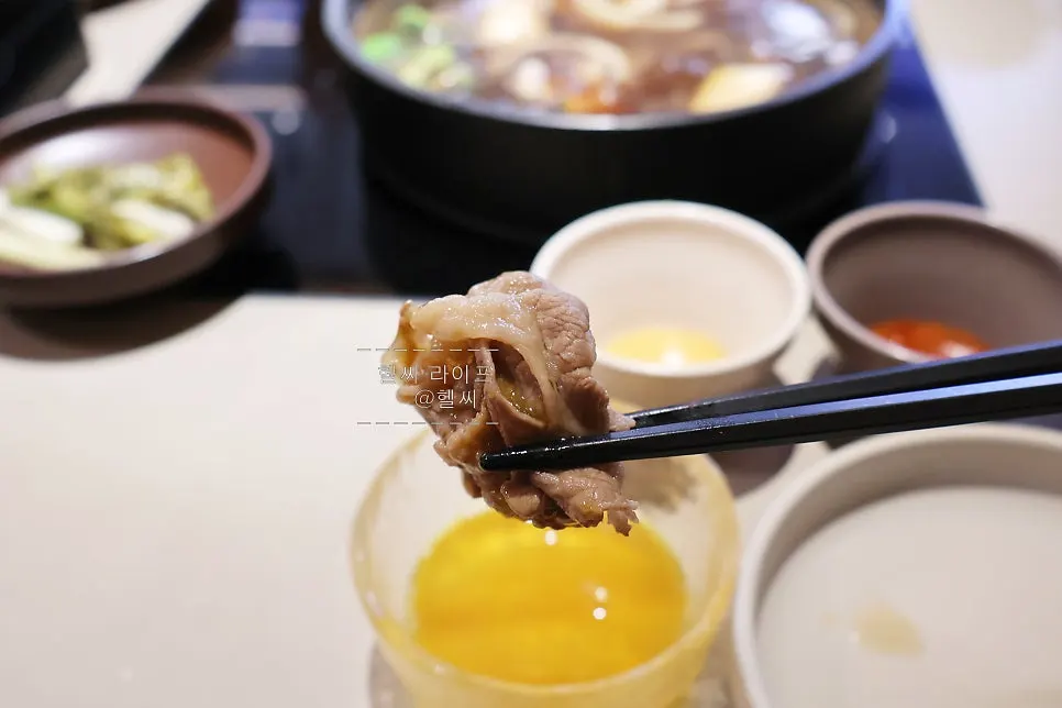 Ingredients cooking in the soy sauce broth for sukiyaki