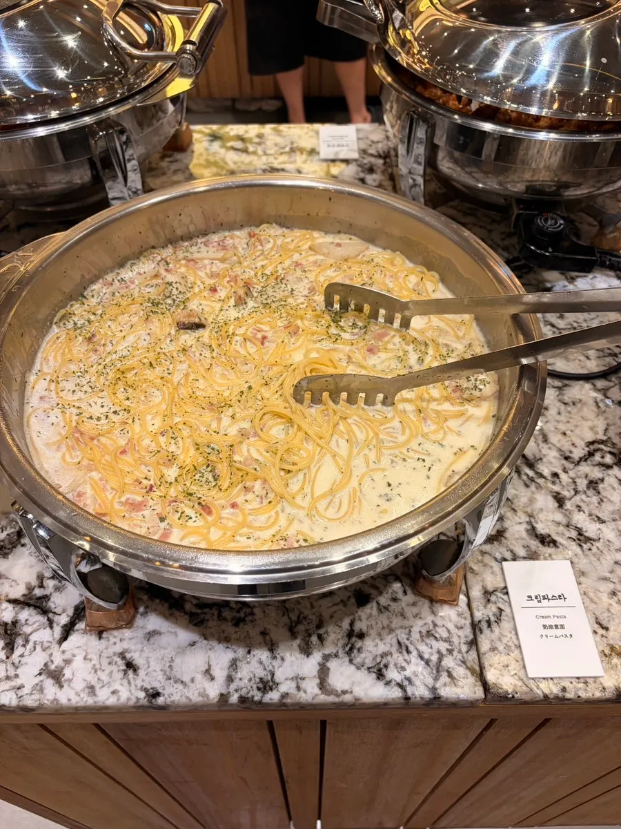 A plate of rich cream-sauce pasta