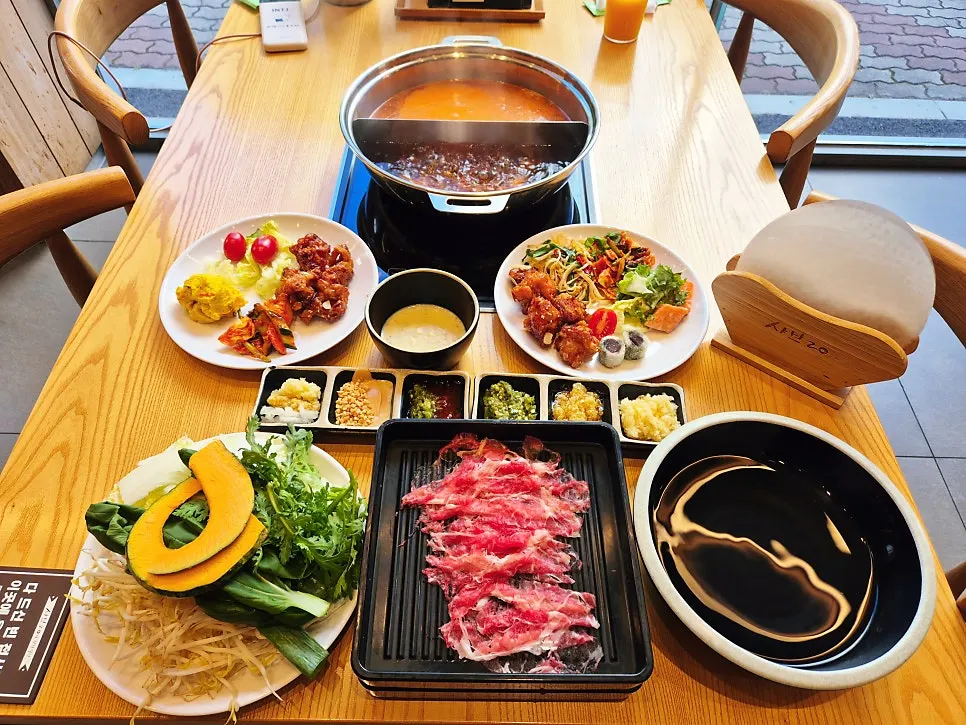 Pot with half spicy and half bonito shabu-shabu broth
