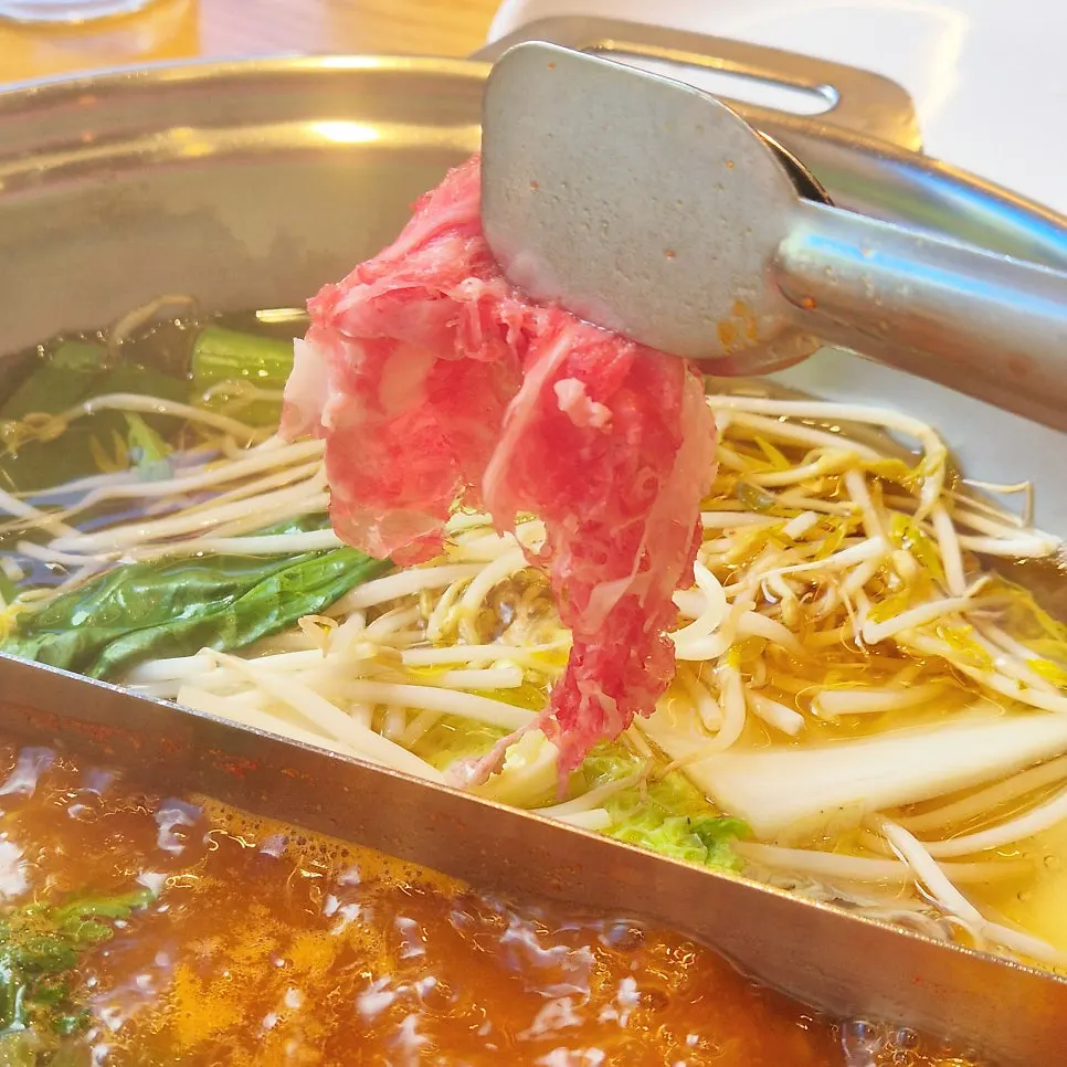 Beef and vegetables cooked in shabu-shabu broth