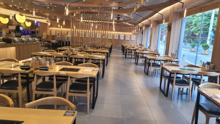 Spacious, clean dining hall seating at Shabu20 Bokhyeon branch