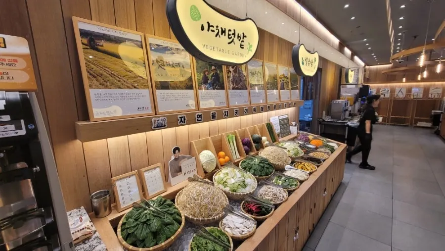 Self-service bar corner stocked with shabu-shabu ingredients