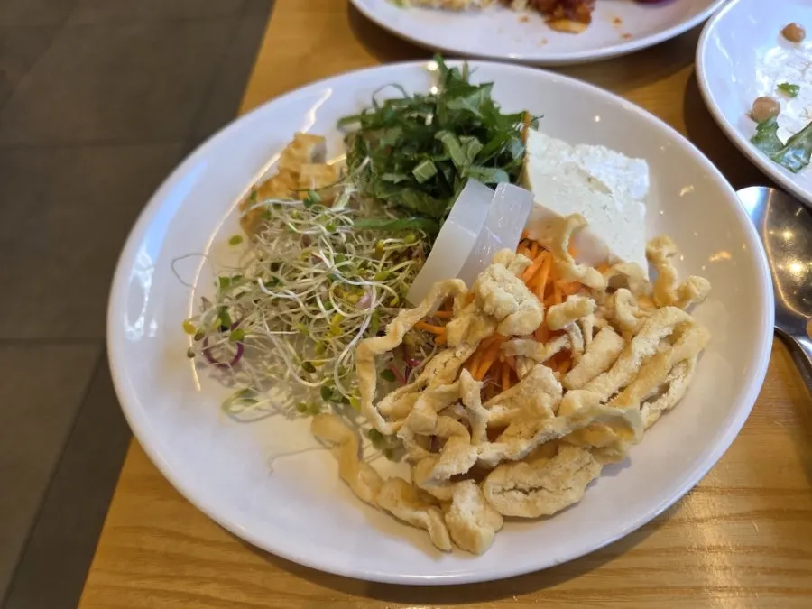 A plate of self-bar dishes brought back to the table