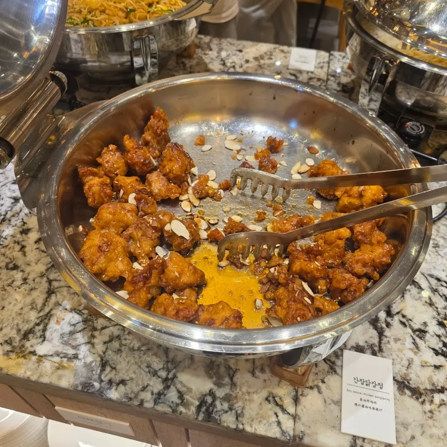 Display of side dishes and vegetables at the salad bar