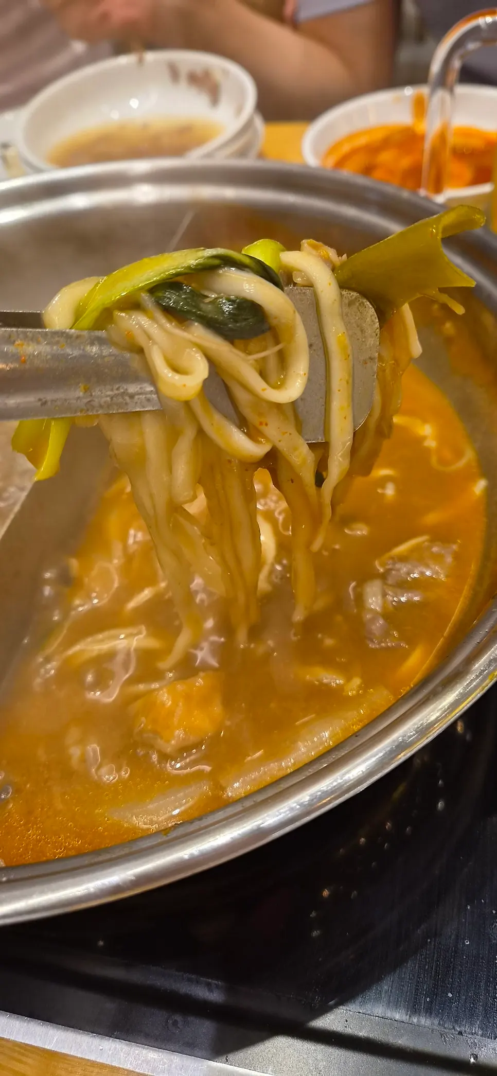 Beef sirloin cooking in the broth