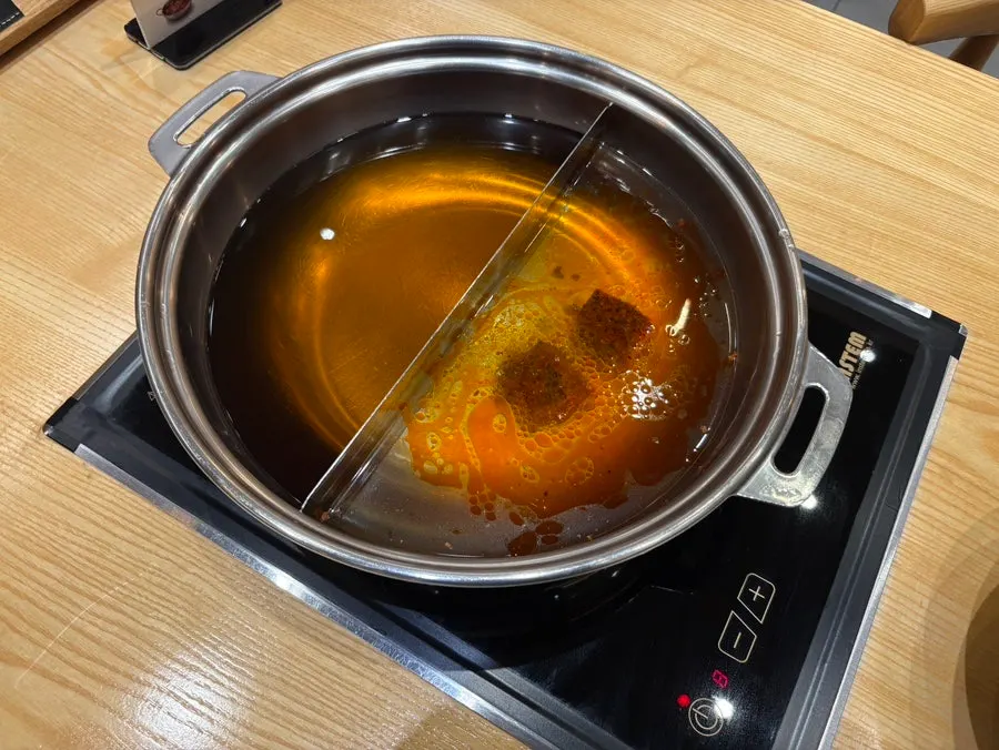 Choosing a broth at the table at Shabu20