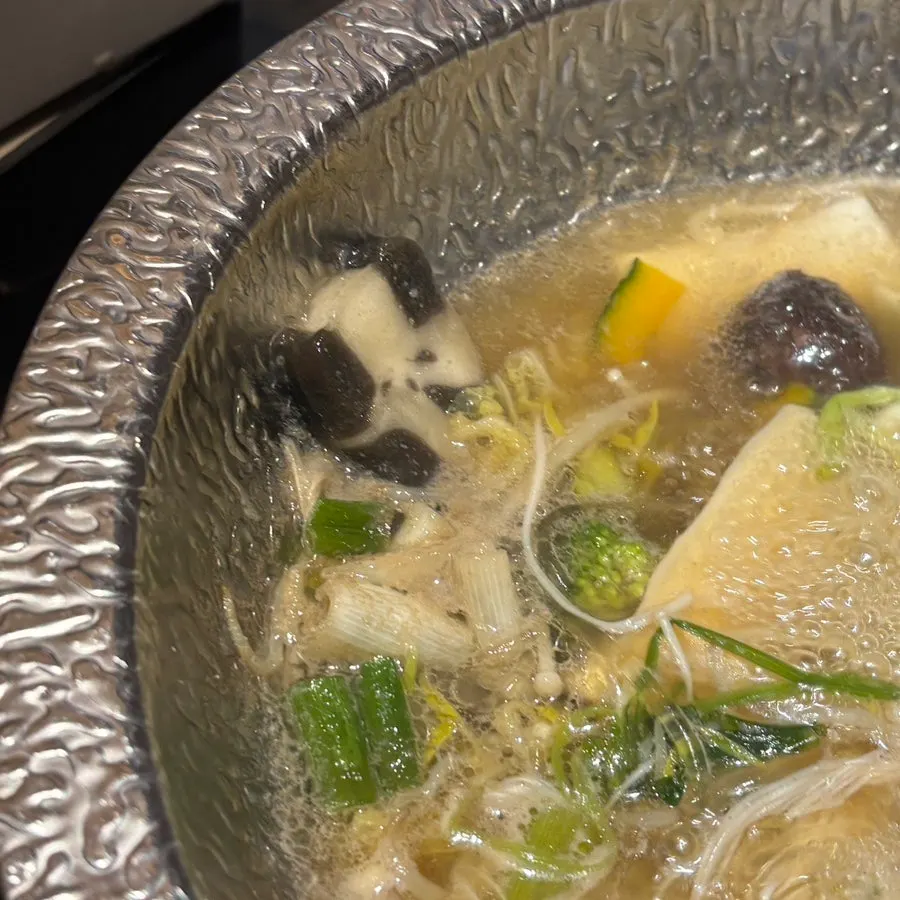 Panda-shaped glass noodles floating in the broth