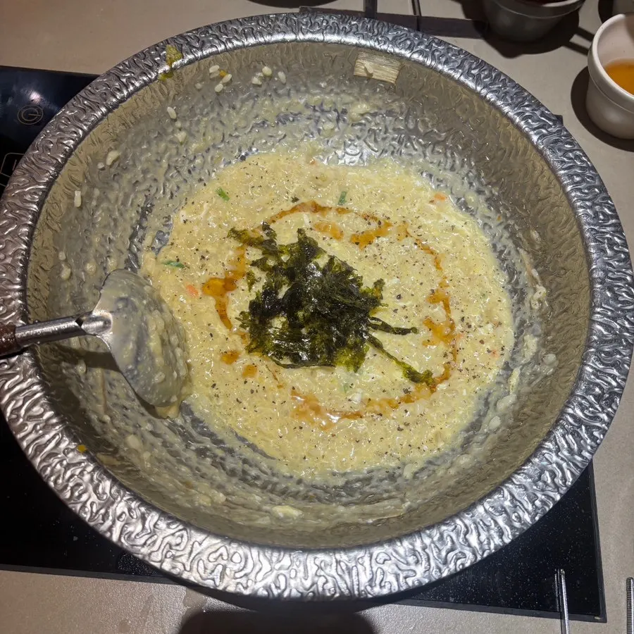 Egg porridge simmered in the clear mushroom broth