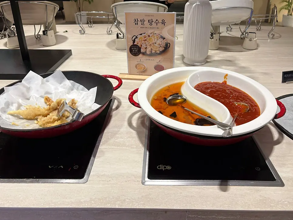 Salad bar corner with warm dishes