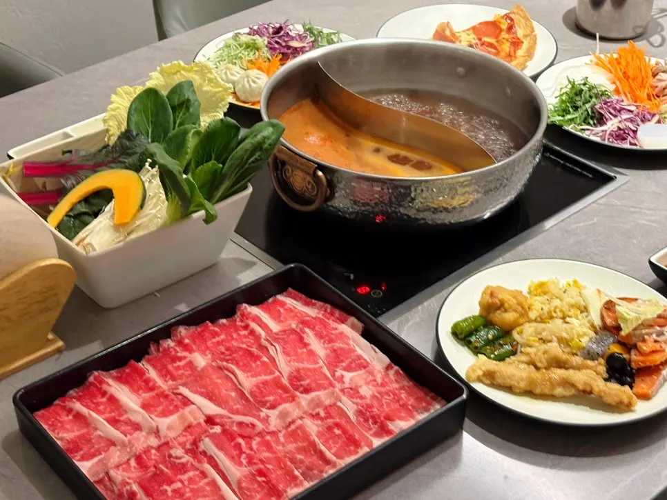 Pot with meat and vegetables cooking